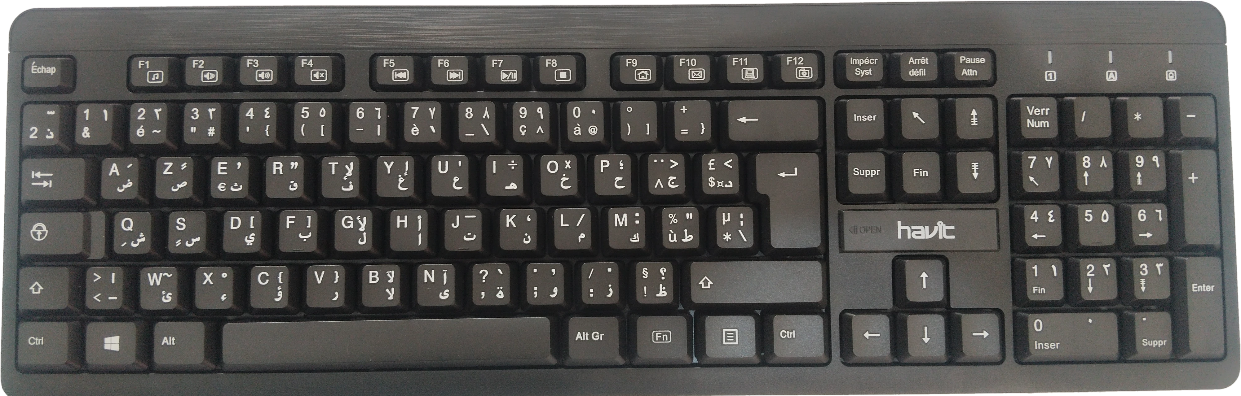 Le clavier de la classe : touches noires AZERTY avec les lettres arabes en dessous, flèches et pavé numérique